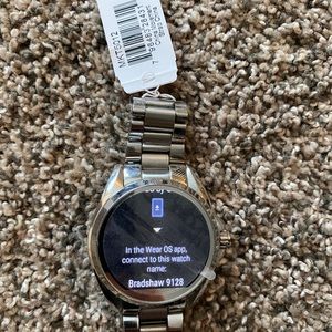 MK Smartwatch Bradshaw 9128 used WITH TAG